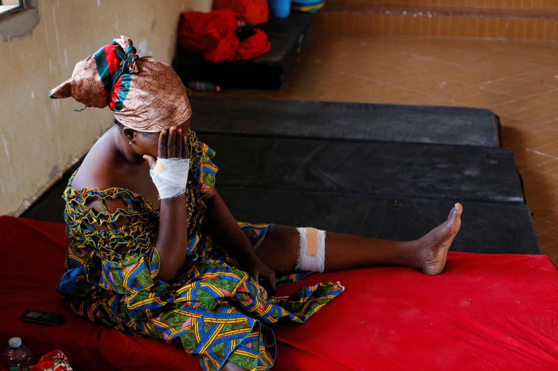 Nancy Nyarko, 51, sits at a shelter for displaced survivors