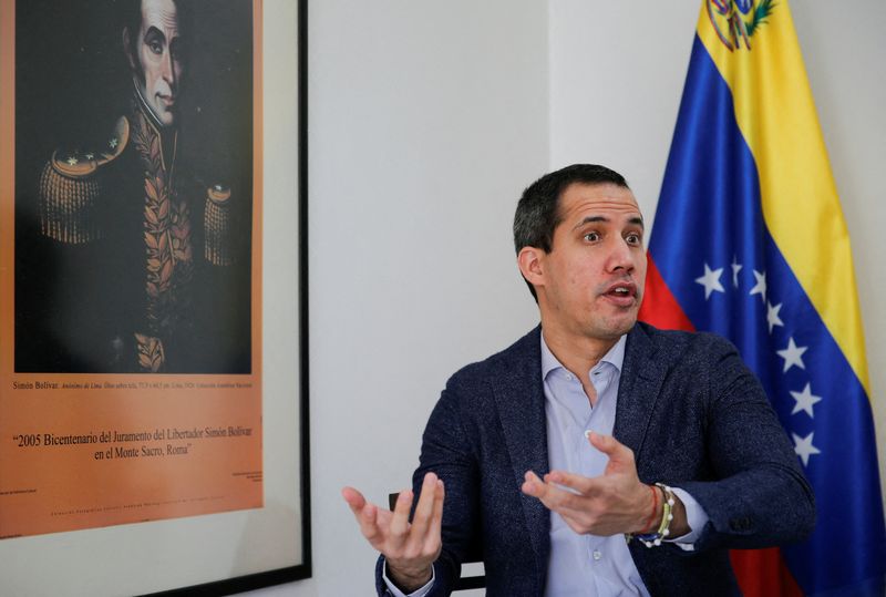 Venezuelan opposition leader Juan Guaido speaks during an interview with