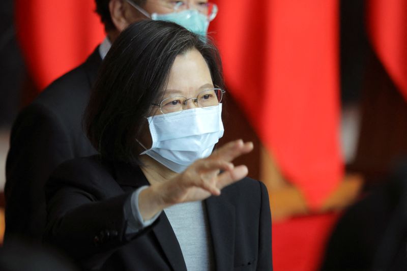 Taiwan President Tsai Ing-wen waves at the end of a