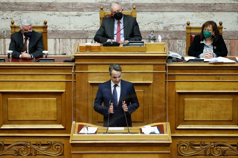 Greek Prime Minister Kyriakos Mitsotakis speaks during a parliamentary session