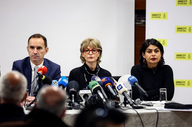 Amnesty International holds a press conference to announce its 211-page