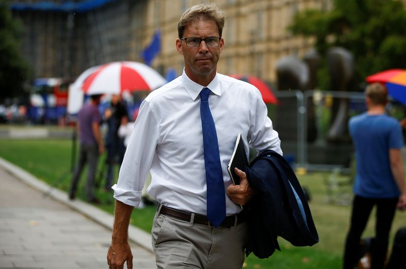 British MP Tobias Ellwood walks outside the Houses of the