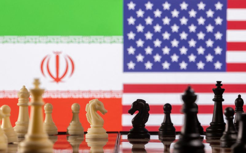 Illustration shows Iran’s and U.S. flags