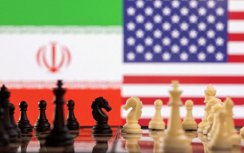 FILE PHOTO: Illustration shows Iran’s and U.S. flags