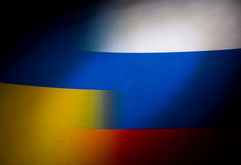 FILE PHOTO: Illustration shows Russia’s and Ukraine’s flags