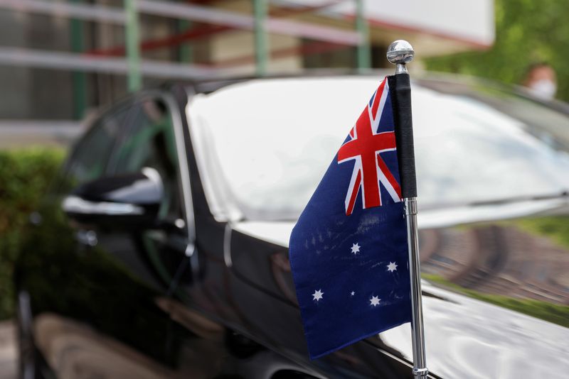 An Australian flag is seen on the car of Australia’s