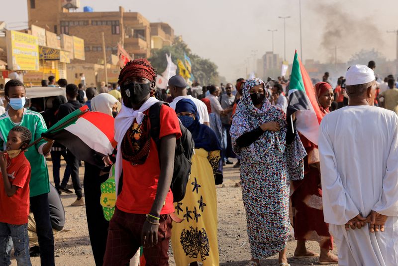 FILE PHOTO: Protesters march during a rally against military rule