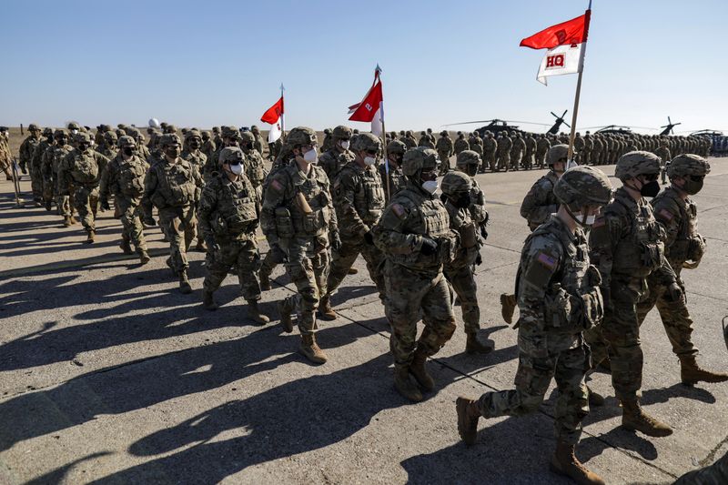 US soldiers march at Mihail Kogalniceanu military airbase in Romania