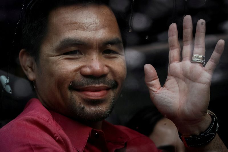 FILE PHOTO: Philippine senator and newly retired boxing icon Manny