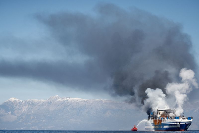 Smoke rises from the Italian-flagged Euroferry Olympia