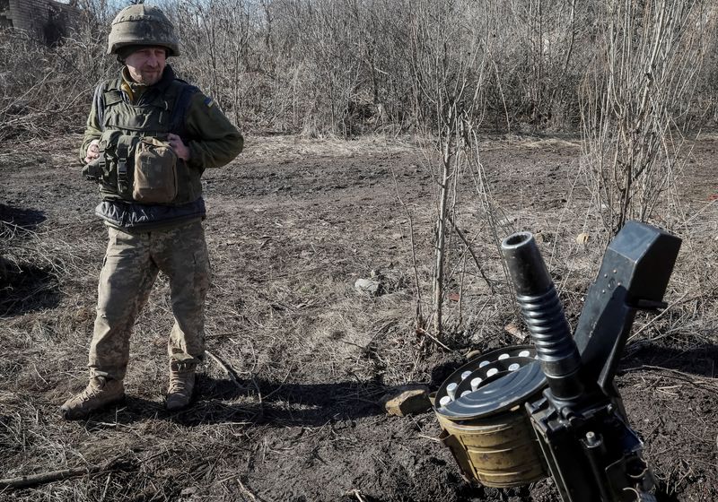 A Ukrainian service member is seen on the front line