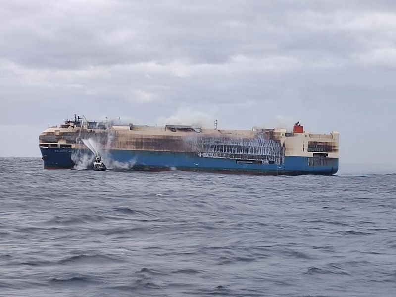 FILE PHOTO: Ship Felicity Ace burns more than 100 km