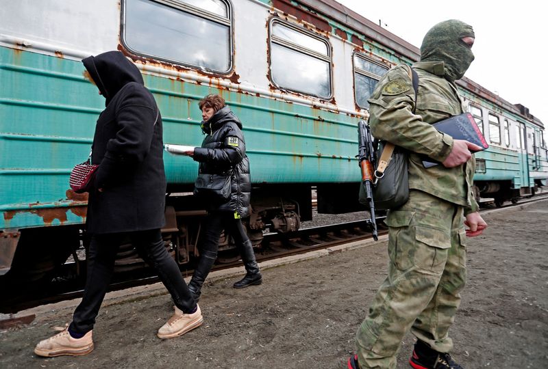 FILE PHOTO: Evacuees leave Donetsk