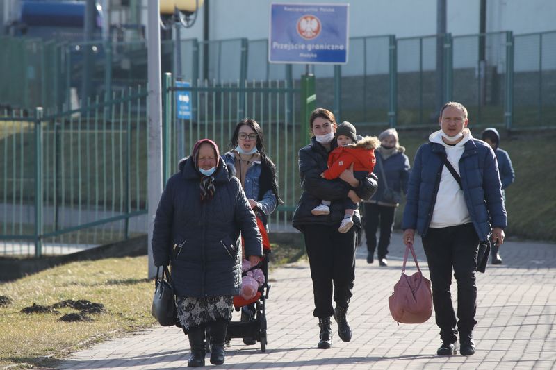 People cross the border between Poland and Ukraine