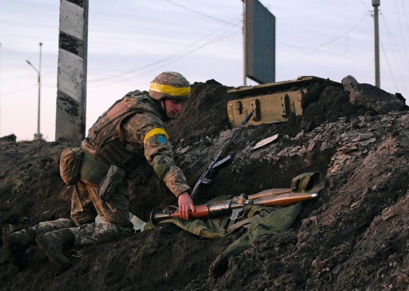 FILE PHOTO: A Ukrainian serviceman holds a rocket-propelled grenade launcher