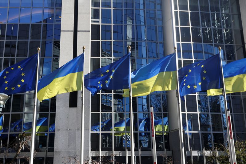 FILE PHOTO: Flags of European Union and Ukraine flutter outside