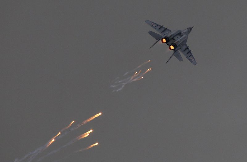 FILE PHOTO: A Polish Air Force MiG-29 aircraft fires flares