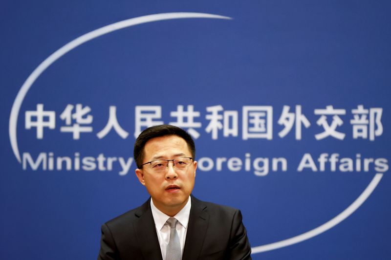 FILE PHOTO: China’s foreign ministry spokesperson Zhao Lijian attends a