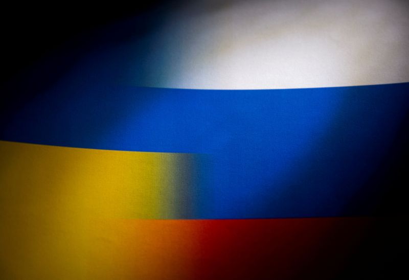FILE PHOTO: Illustration shows Russia’s and Ukraine’s flags