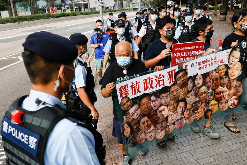 FILE PHOTO: Pro-democracy protesters hold a banner during a protest