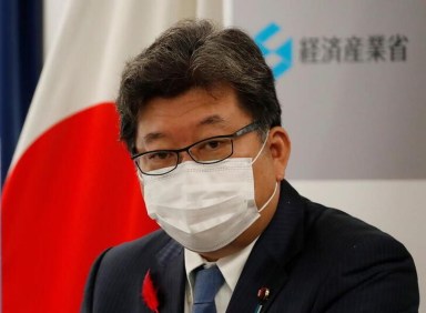 Japan’s new Economy, Trade and Industry Minister Koichi Hagiuda wearing