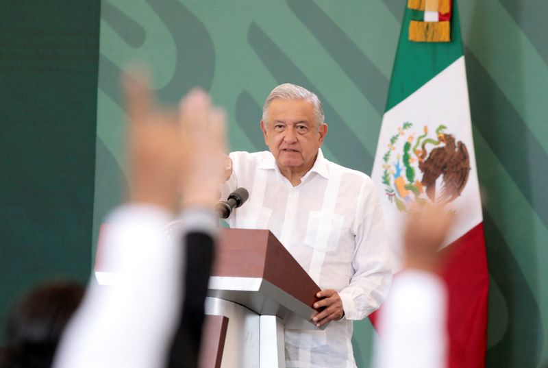 FILE PHOTO: Mexican President Andres Manuel Lopez Obrador holds a