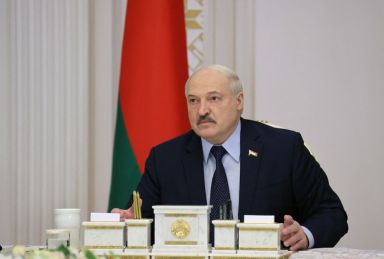 Belarusian President Alexander Lukashenko chairs a meeting with military officials