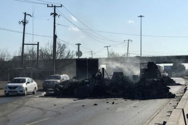 FILE PHOTO: Vehicle set ablaze after detention of a gang