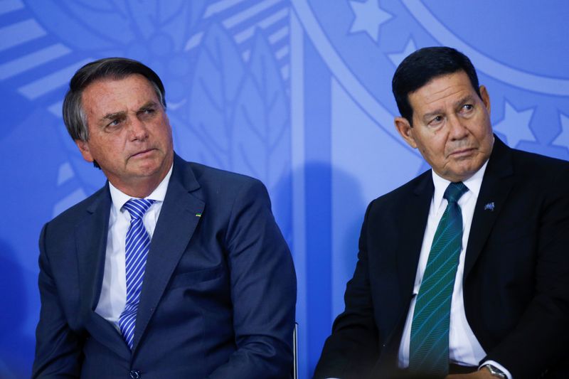 FILE PHOTO: Brazil’s President Jair Bolsonaro and Brazil’s Vice President