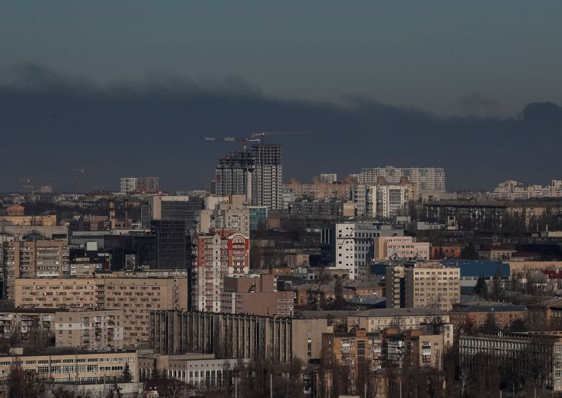 Smoke rises after shelling amid Russia’s invasion, near Kyiv