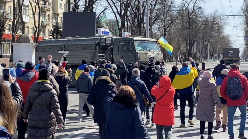 FILE PHOTO: ‘Go home’ – Protestors confront Russian military vehicles