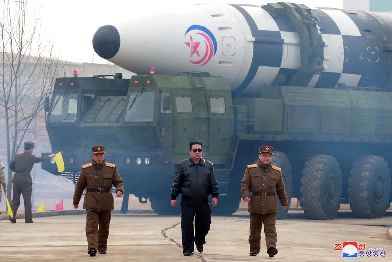 North Korean leader Kim Jong Un walks away from what