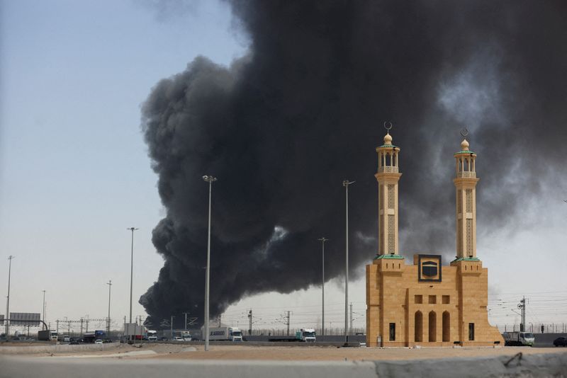 FILE PHOTO: Smoke billows from a Saudi Aramco’s petroleum storage