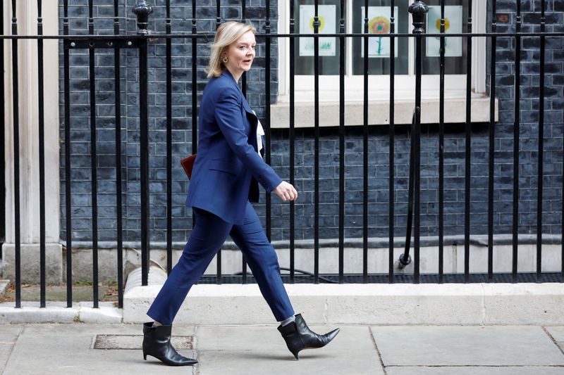 FILE PHOTO: British Foreign Secretary Truss walks outside Downing Street