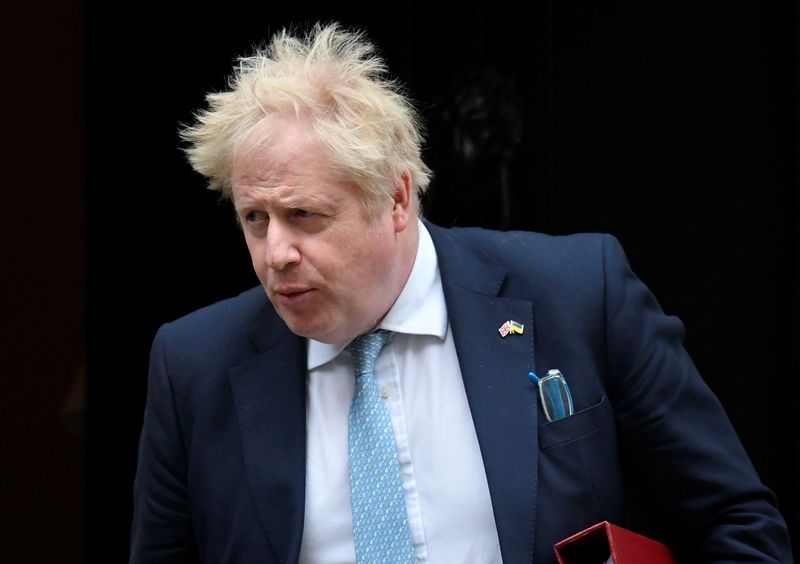 British PM Johnson leaves Downing Street to attend question time