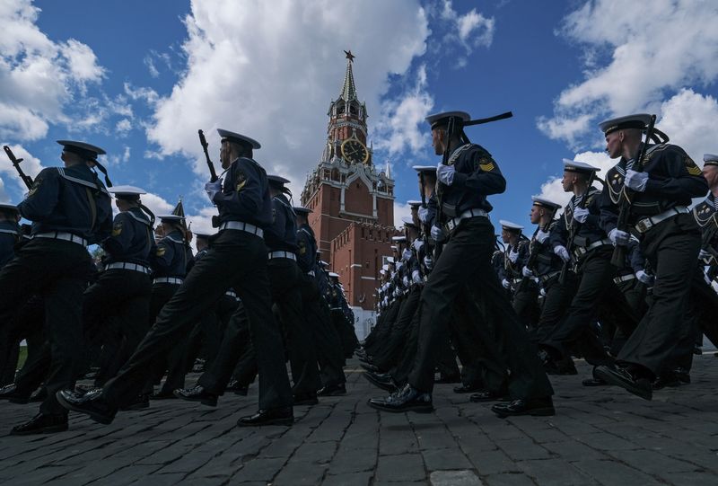 FILE PHOTO: Russian servicemen march during a rehearsal for the