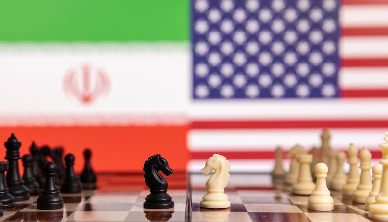 Illustration shows Iran’s and U.S. flags