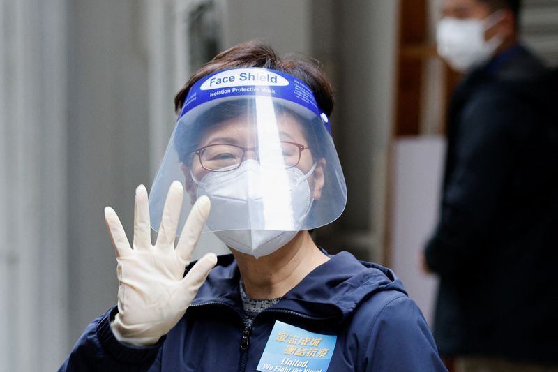 Hong Kong Chief Executive Lam delivers anti-epidemic bags to residents
