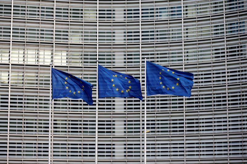 FILE PHOTO: EU flags flutter outside the EU Commission headquarters
