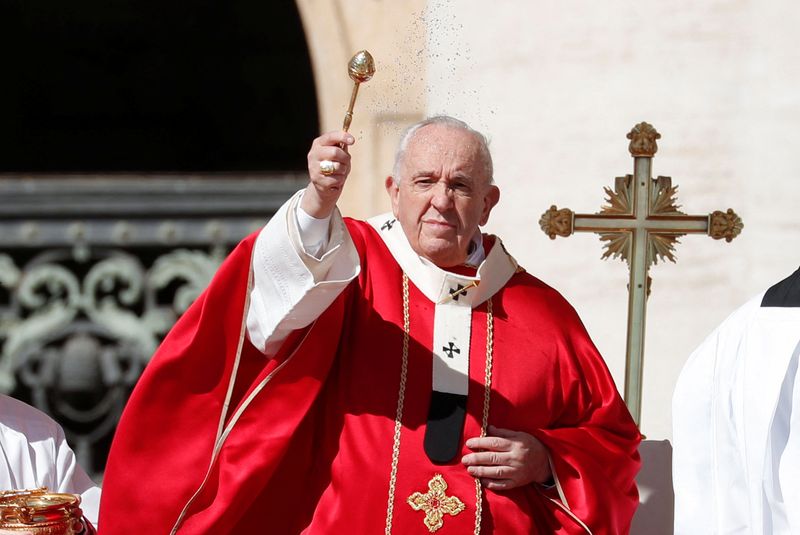 Pope Francis leads Palm Sunday services at the Vatican