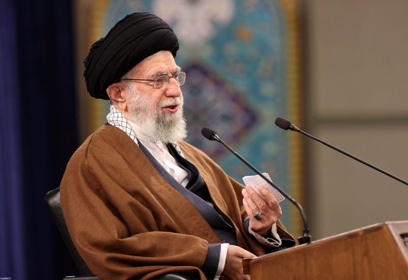 Iranian Supreme Leader Ayatollah Ali Khamenei attends a meeting with