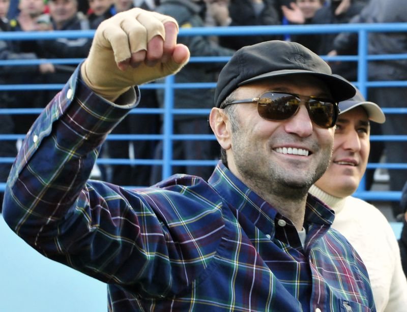 Dagestani born tycoon Kerimov watches a soccer match between Anzhi