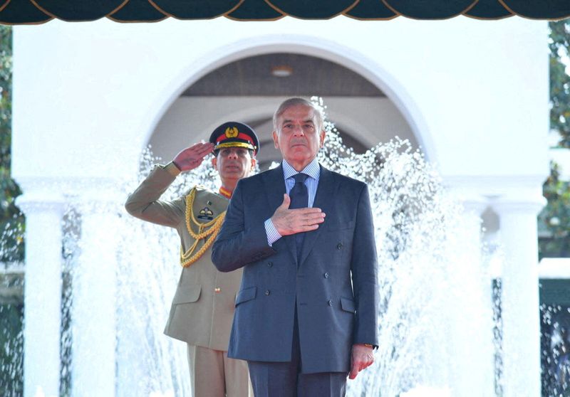 FILE PHOTO: Pakistan’s Prime Minister Shehbaz Sharif gestures during the