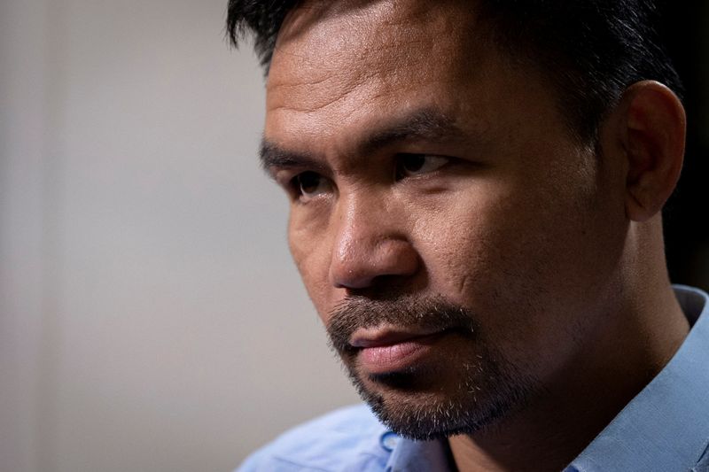 FILE PHOTO: Presidential candidate and former boxing champion Pacquiao speaks