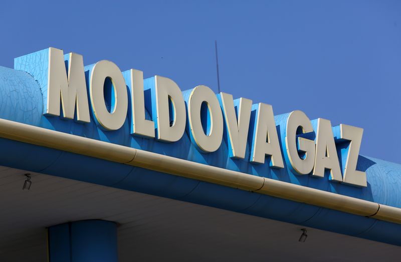 The logo of Moldovagaz energy company is on display in