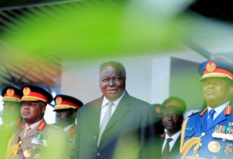 FILE PHOTO: Kenya’s President Mwai Kibaki attends a farewell ceremony