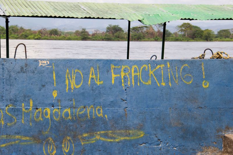 A graffiti that reads “No to fracking” is seen on