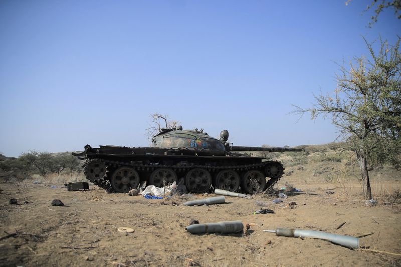 FILE PHOTO: Ammunition is seen next to a tank destroyed