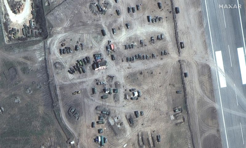 FILE PHOTO: A satellite image shows airborne vehicles, tanks and