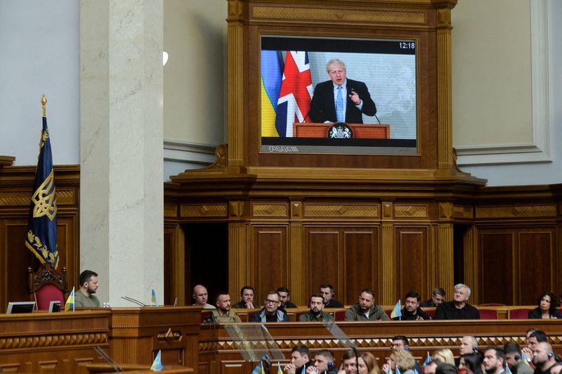 FILE PHOTO: Ukraine’s President Zelenskiy and British PM Johnson address